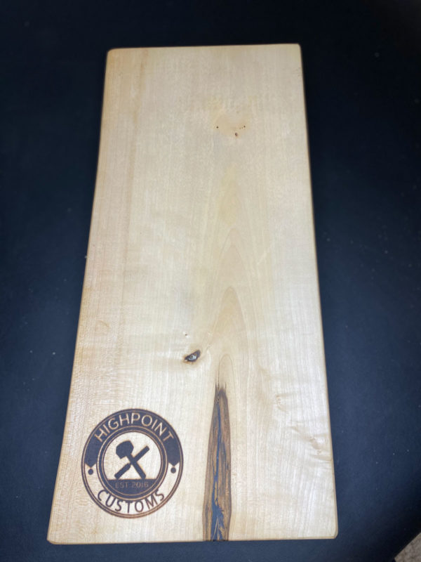 Live edge Maple Cribbage Board with highpoint customs logo branded onto it