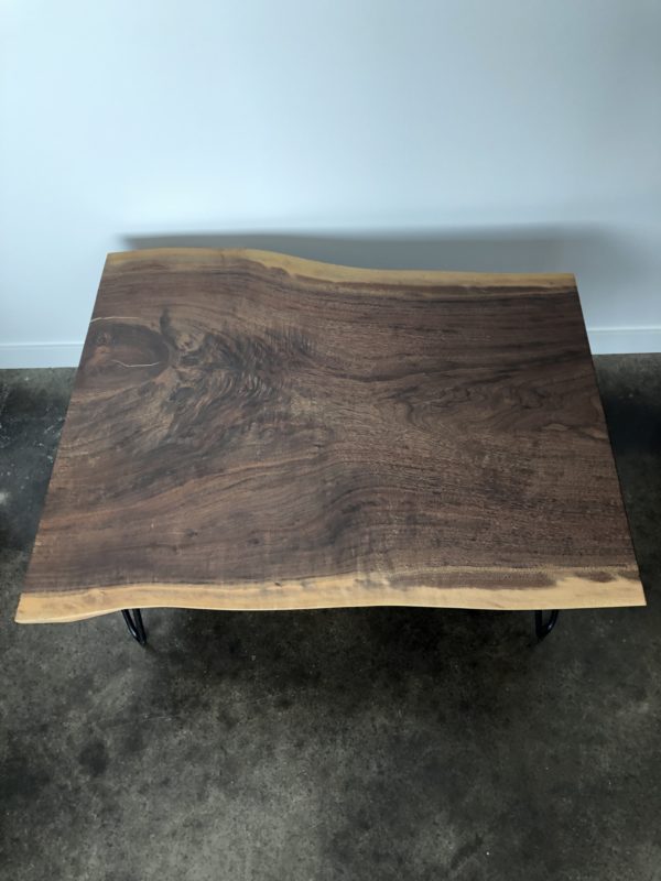 Live edge black walnut coffee table with black hairpin legs